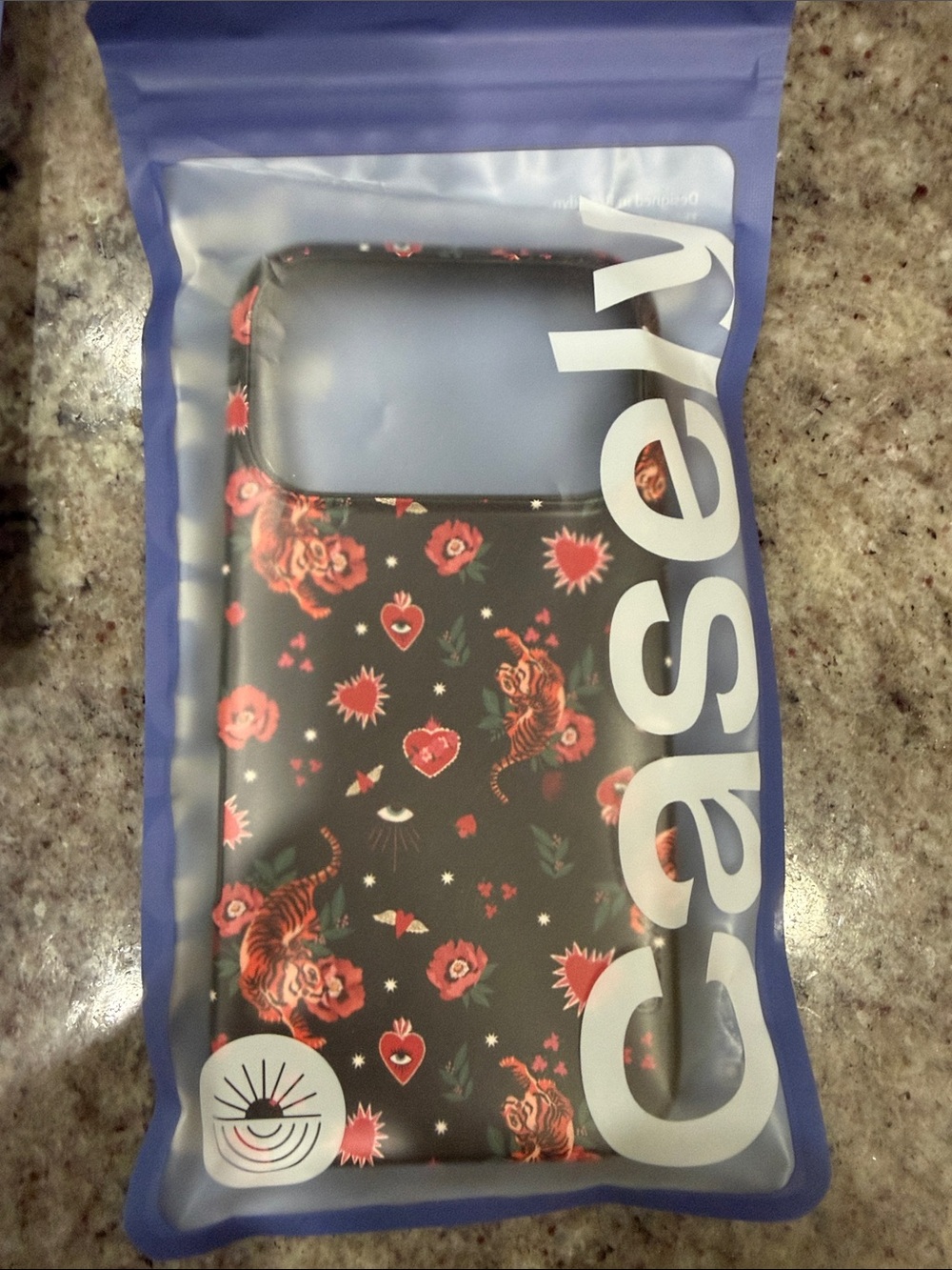 CASELY IPhone 17 pro Floral Tiger Pattern Black Phone Case - Red Accents